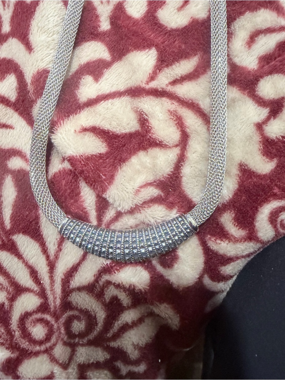 This is a QVC Steel by Design stainless steel mesh necklace with rhinestones.